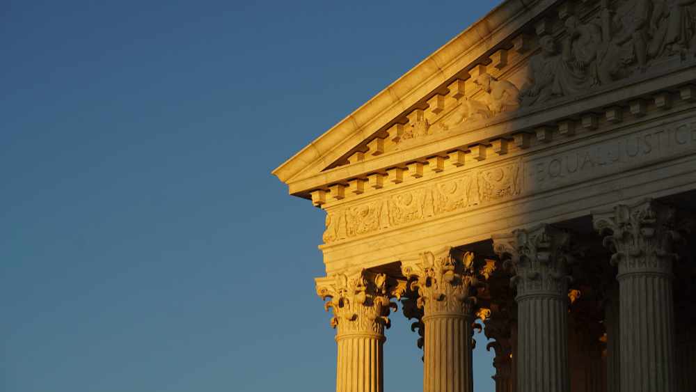 image of US Supreme Court building in gold sunlight